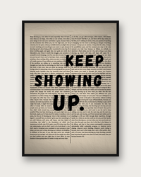 Keep Showing Up poster framed on a wall — motivational wall art